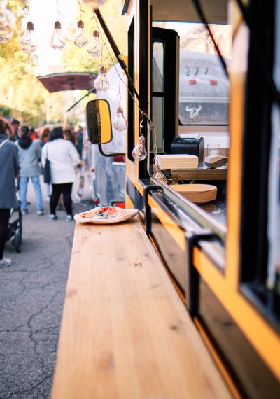 A plate of pizza in a food truck fest