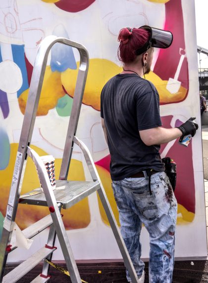 Moscow, Russia - July 15, 2017:  The festival of street art "30 faces of you" was held in the Museon Art Park. The 30 brightest Street Wave artists gathered in the Art Park to create an open-air exhibition in real time. The artist - Kanevsky.